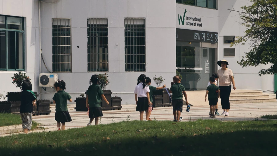 about international school of wuxi students walking to class